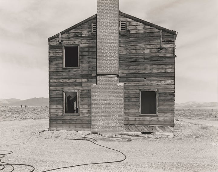 Photographer Mark Ruwedel's mounted gelatin silver print, Typical American House, 2011. 