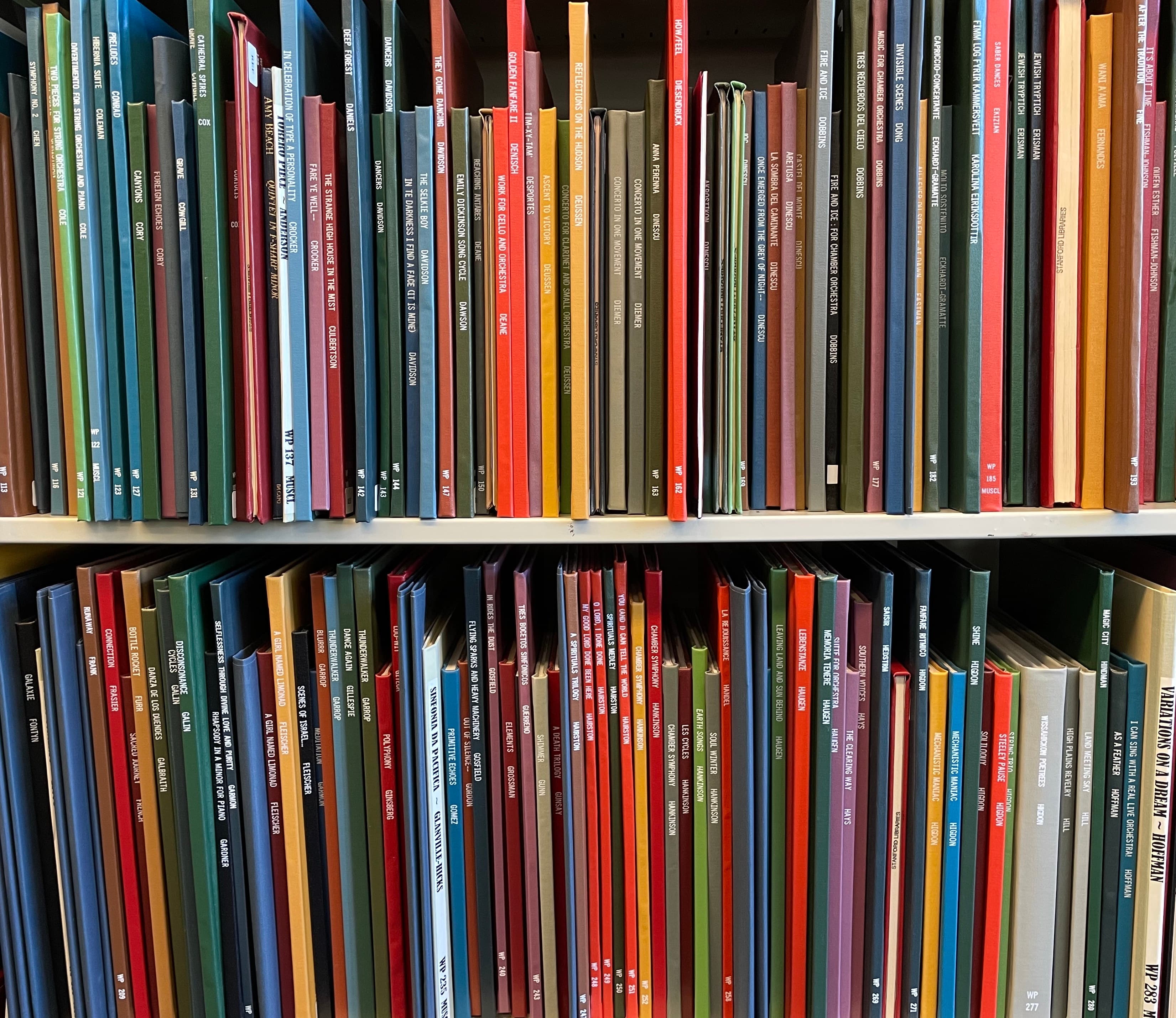 Bound scores on a shelf