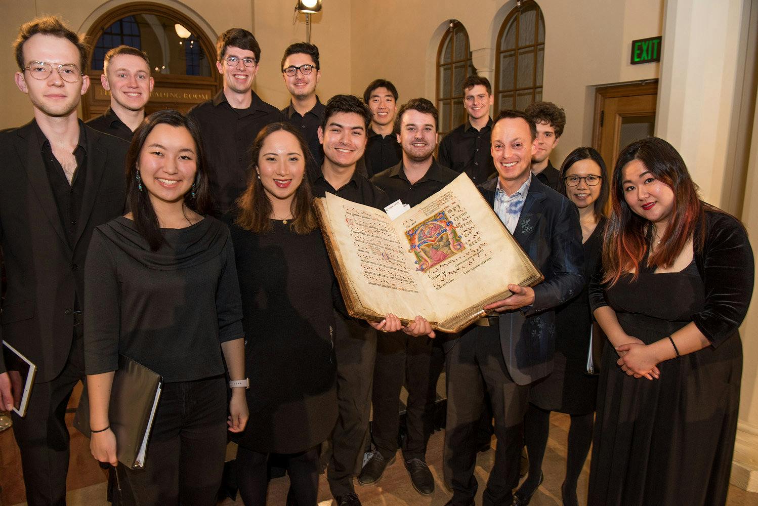 Professor Rodin and students from Music 159J with the 15th century choir book used in the performance.